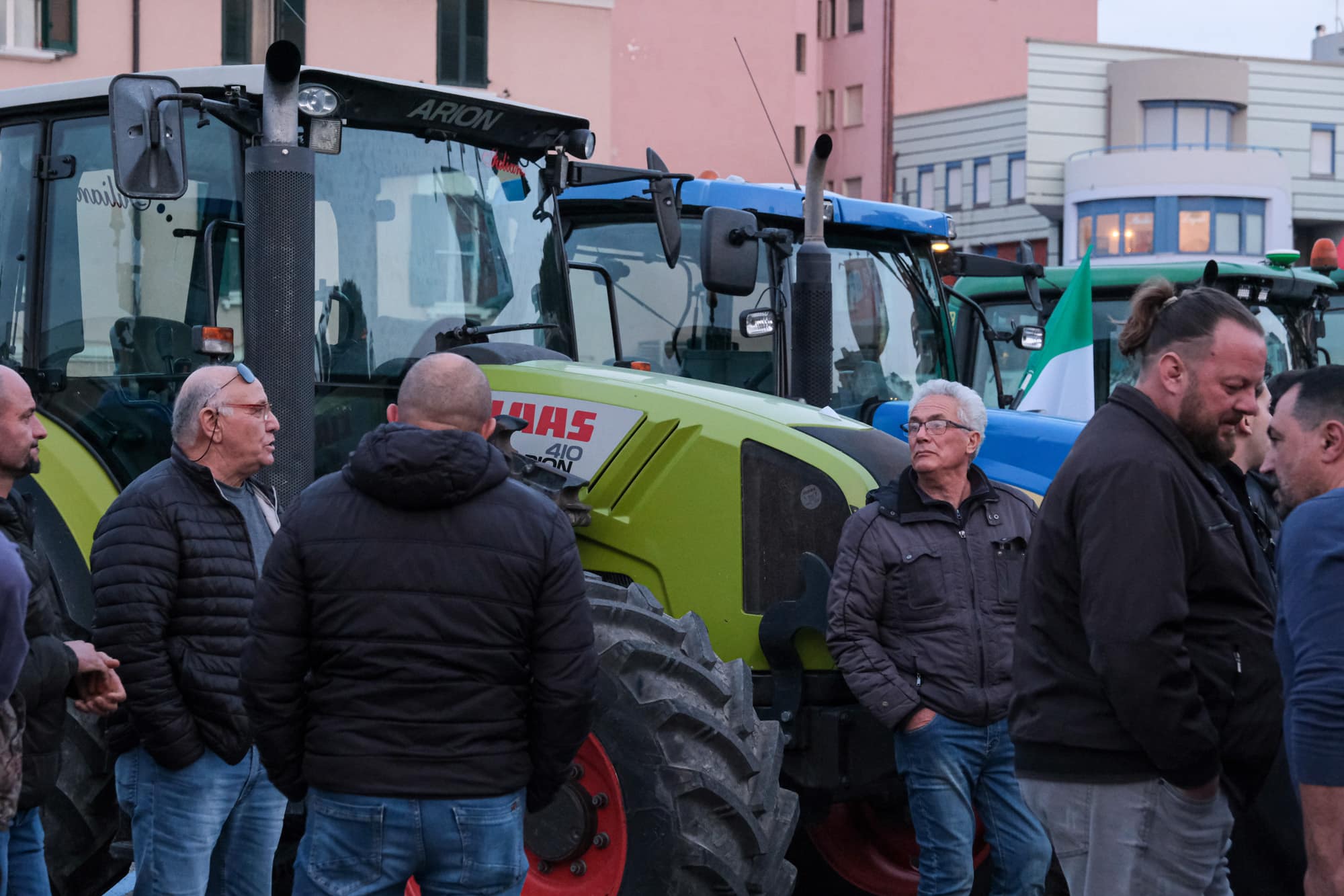 Farmers speak in front of their tractors. Farmers garrison Piazza Donatori di Sangue in the centre of Termoli. (ph. Elena Vizzoca©Unicode Images)