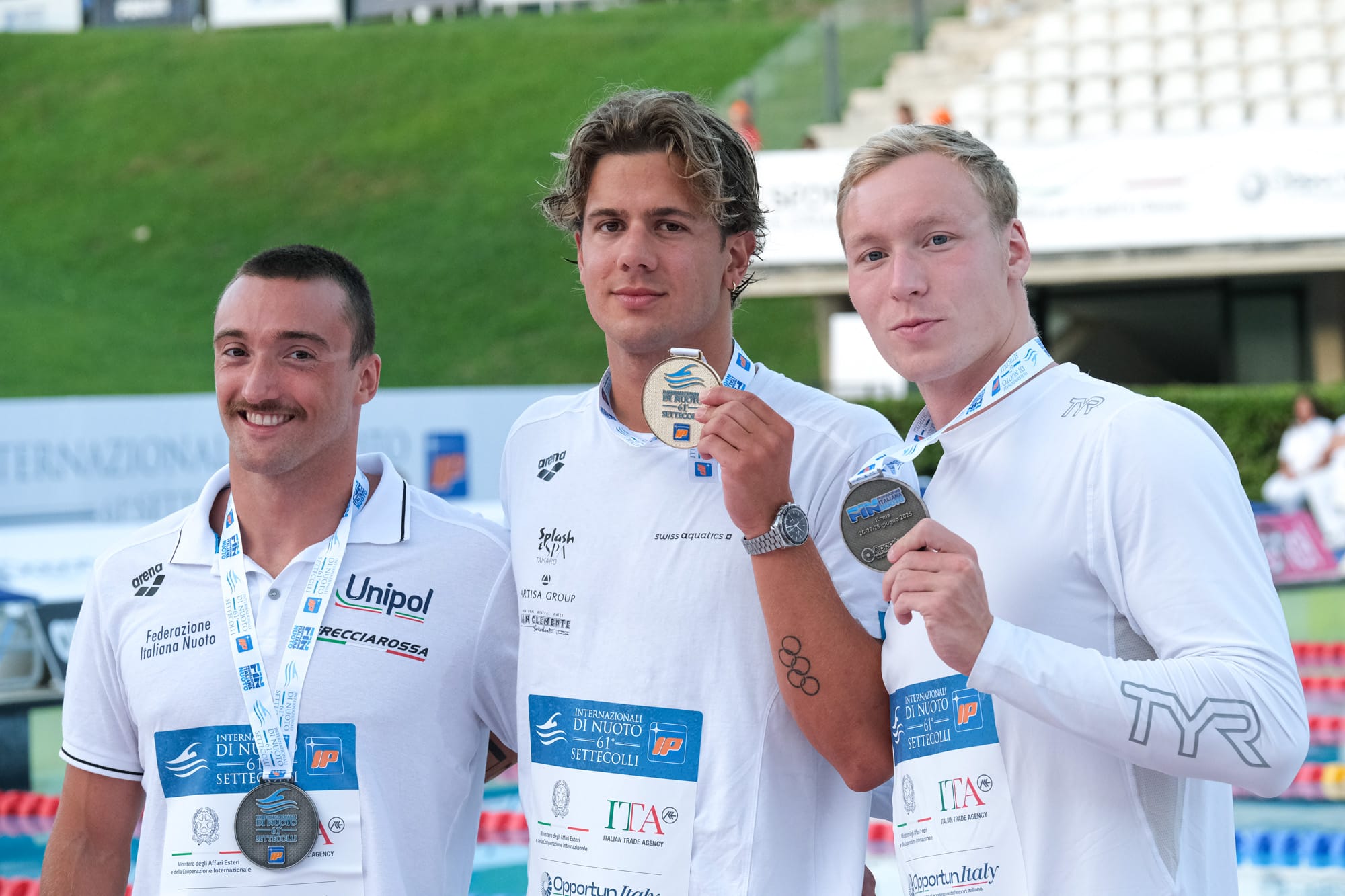 First place for Noe Ponti of Switzerland (C). On the second place Federico Burdisso of Italy (L) while on the third Andrei Minakov (NAB) (R). Podium of Men Men 100m Butterfly